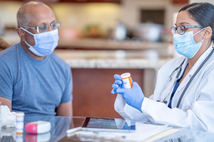 Man getting his medicine looked at